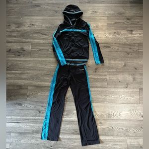 BCBG MaxAzria jacket and pant set. Women’s size Medium.